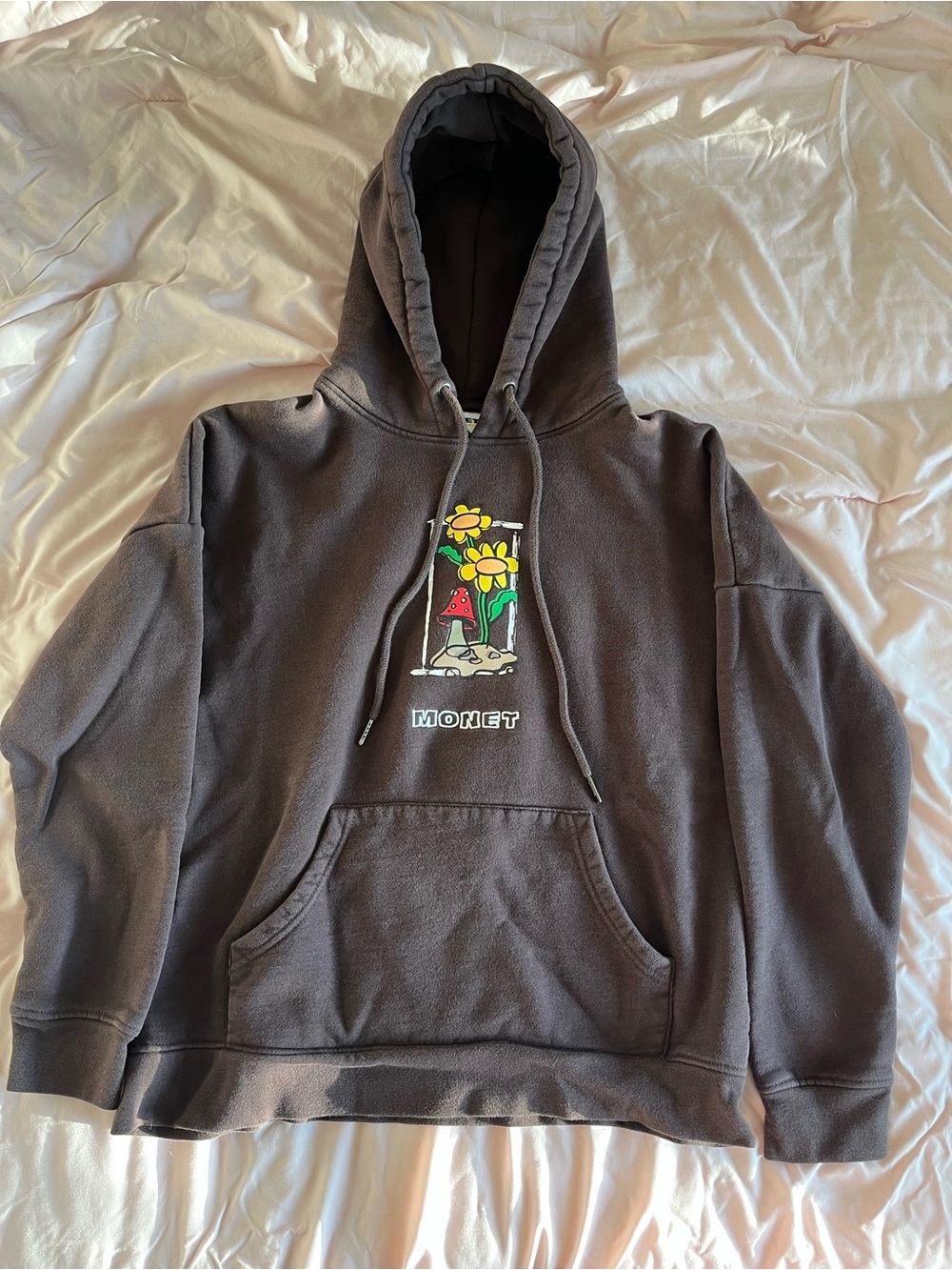 Monet Black Hoodie with Yellow Floral Graphic